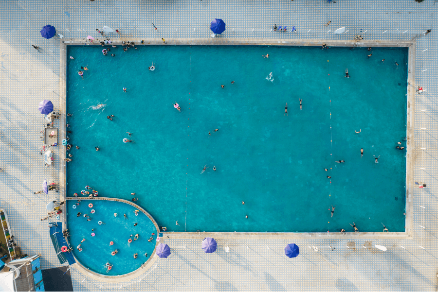 Aerial view of a swimming pool with stunning surroundings